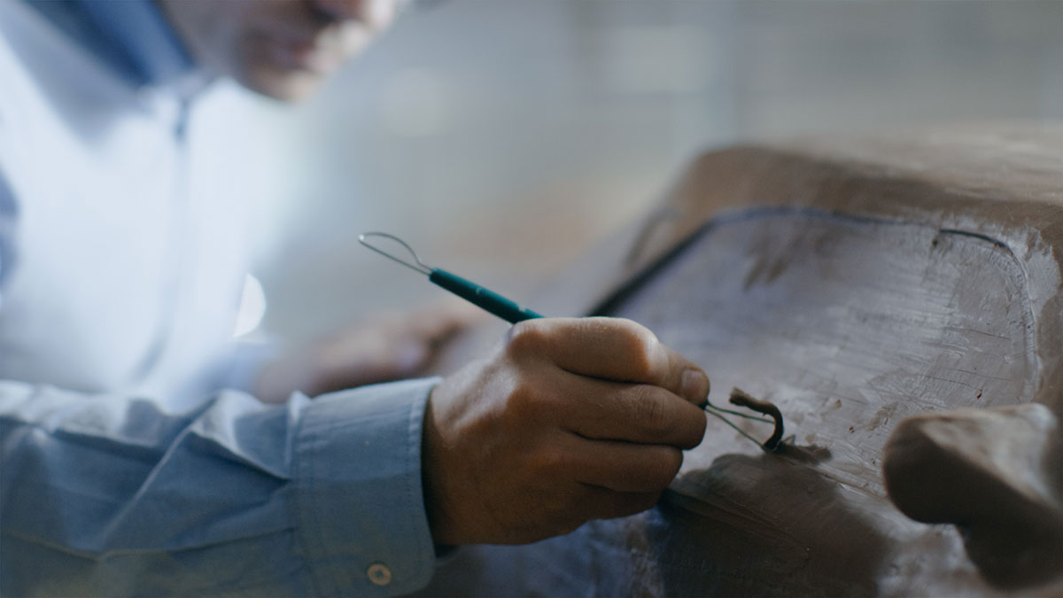 A designer doing clay modeling.